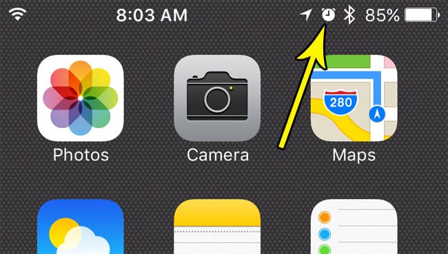 what is the clock icon at the top of iphone screen